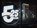 �25